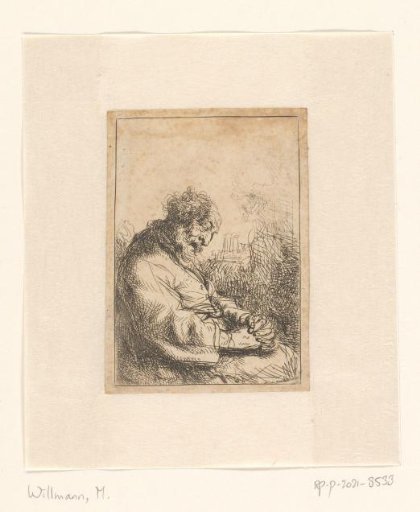 Sleeping old man in a chair
