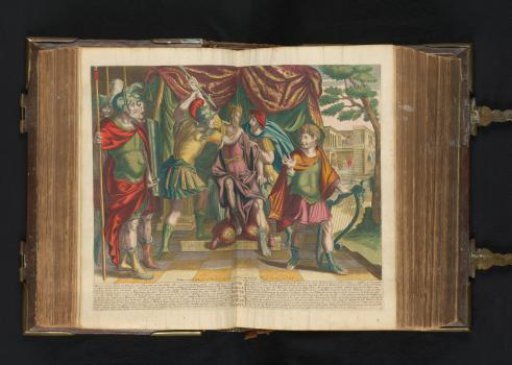 Saul aims his spear at David