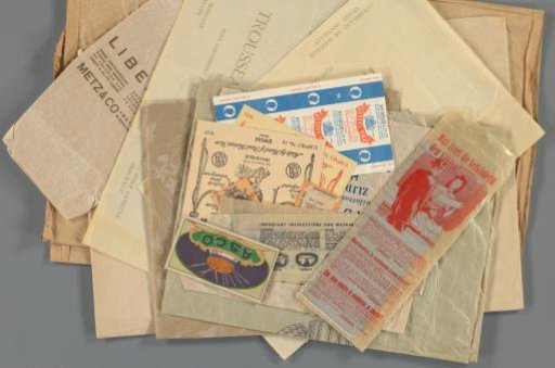 Packaging material, paper bags and wrapping paper