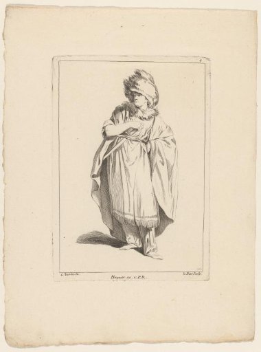 Standing figure with hand on sword