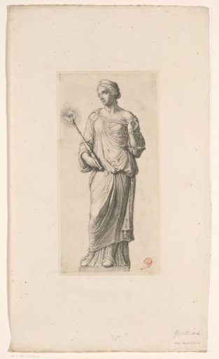 Statue of Justitia (Justice) on the front facade of the Town Hall on the Dam