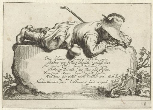 A shepherd lies on a rock