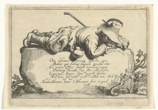 A shepherd lies on a rock