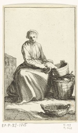 Young woman plucking a chicken