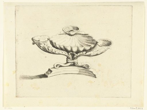 Shell-shaped bowl lying in a holder consisting of three horns