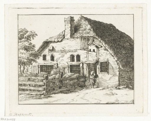 Woman with a basket in front of a house in Staphorst
