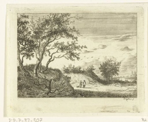 Dune landscape with a man, woman and dog