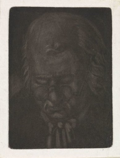 Head of an old man with spectacles