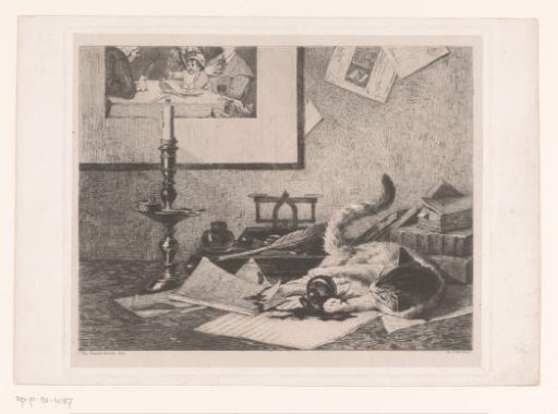 A playing cat knocks an inkpot over on the table