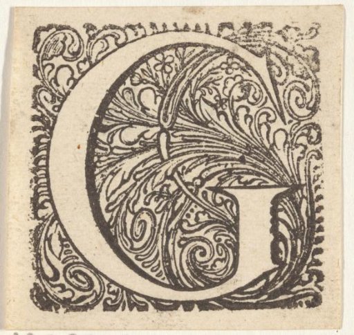 Letter G in an ornamental frame