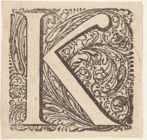 Letter K in an ornamental frame
