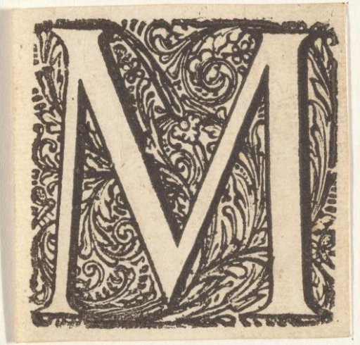 Letter M in an ornamental frame