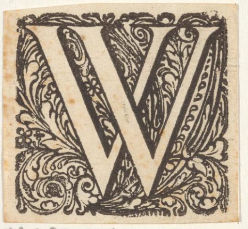 Letter W in an ornamental frame