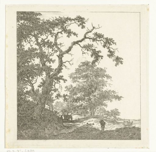 Crossing sandy path with carts and a man with a pack on his back
