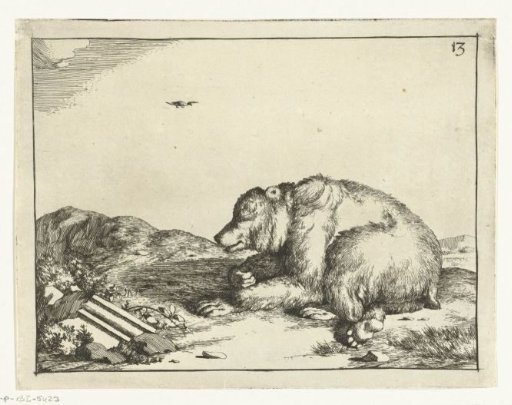 Lying bear near part of a decorative moulding