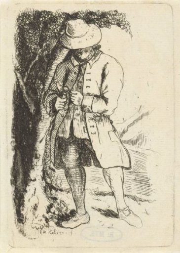 Standing man examining an object with a magnifying glass