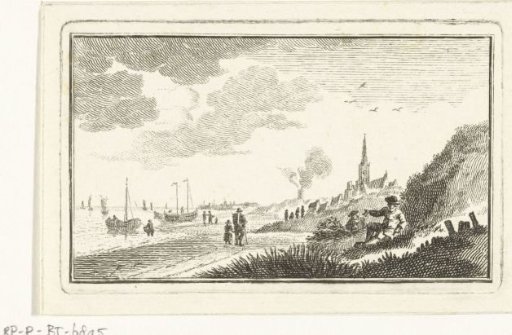 Coastal view with village in dunes and fishing boats on the beach