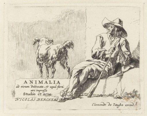 Sitting shepherd with his dog