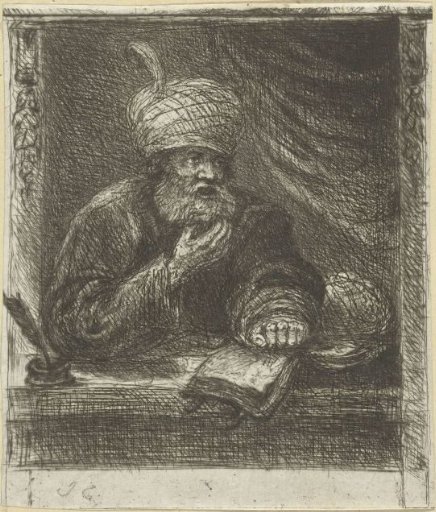 Man with turban behind a writing desk