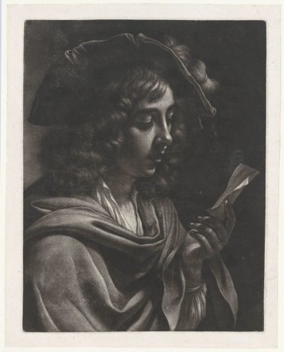 Boy reading a letter