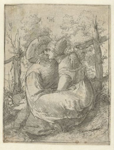 Lovers sitting in front of a fence