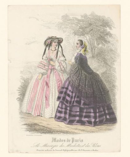 Two women in Parisian fashion in a park