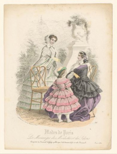 Two women and a girl in Parisian fashion in a garden