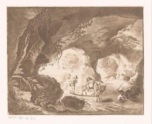 Traveller with two donkeys in a cave
