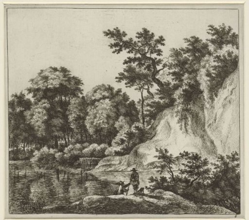 Landscape with a large rock by the water
