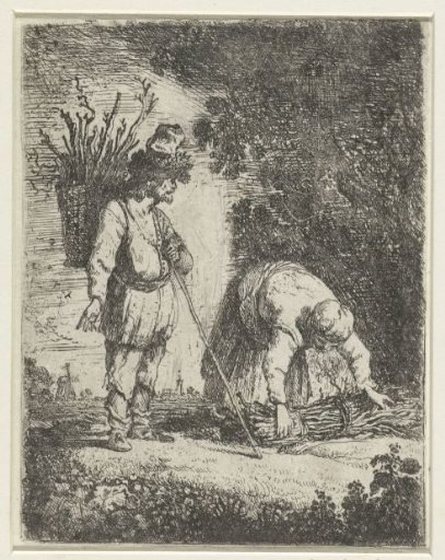 Man and woman gathering wood