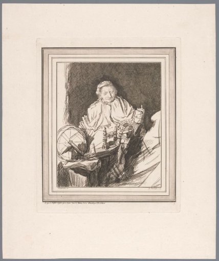 Old woman at a spinning wheel