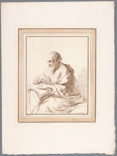 Seated old man writing in a book