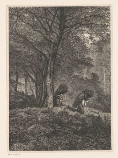 Two women with bundles of branches in the forest