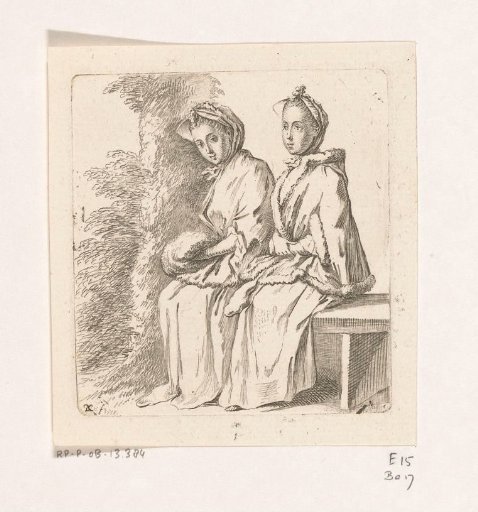 Two ladies sitting by a tree