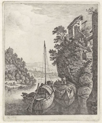 Two boats near a rock