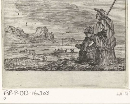 Dune landscape with a man sitting on two baskets
