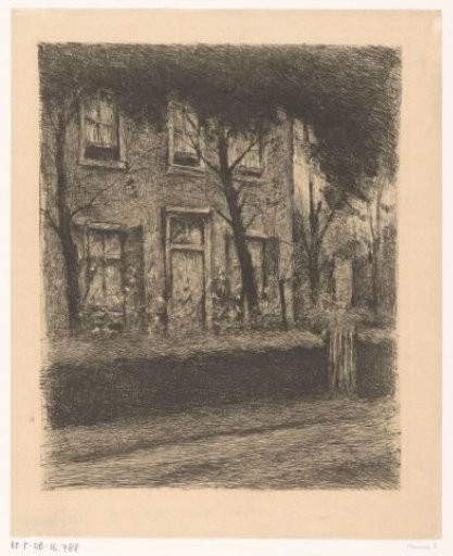 Front garden of a house with a hedge