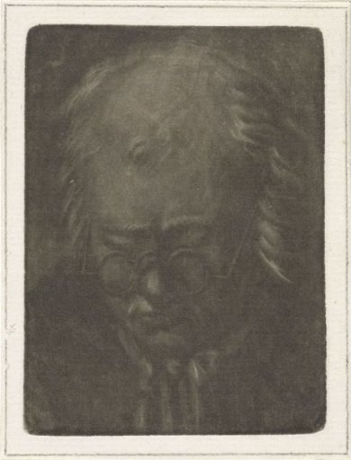 Head of an old man with spectacles