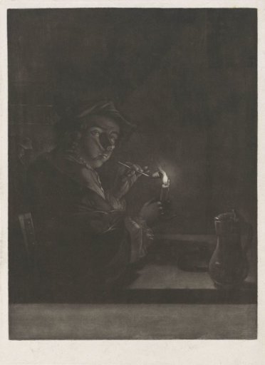 Man lighting his pipe