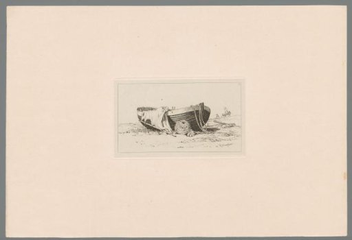 Small fishing boat with sail, rope and basket lying on the beach of Rottingdean