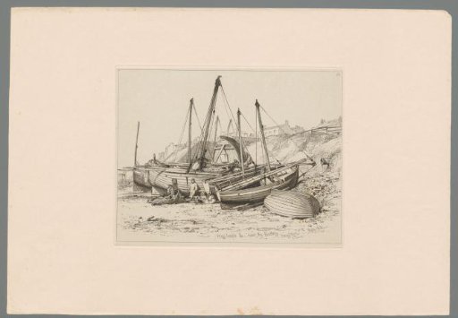 Five figures near fishing boats on the beach of Brighton, houses in the background