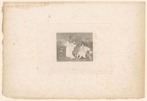 Two women and a man in a garden