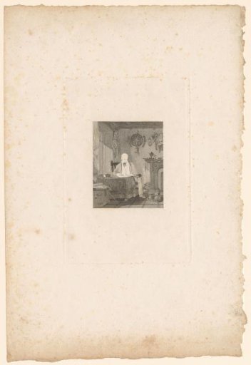 Man writing at a table