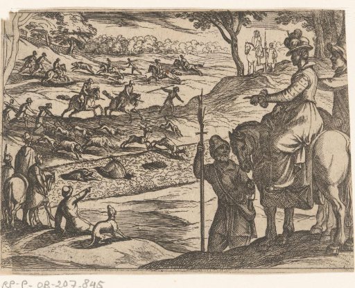 A lady watching hunters hunt animals in a pit