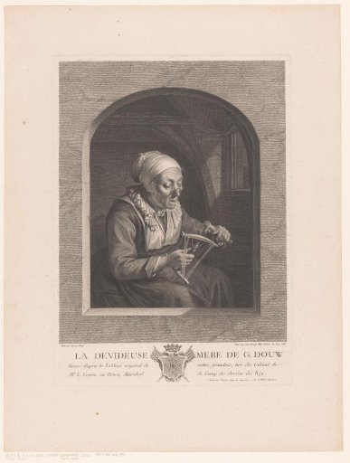 Woman winding yarn on a reel