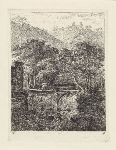 Man on a bridge above a waterfall