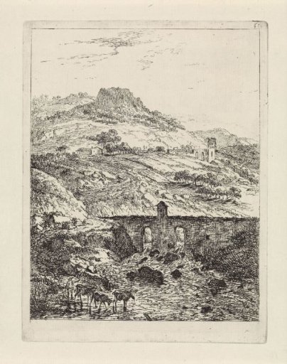 Hilly landscape with a stone bridge