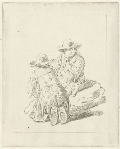 Two boys sitting on the ground