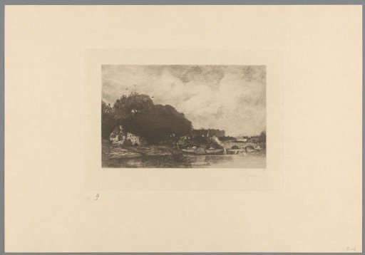 View of a bridge, boats and houses on the water