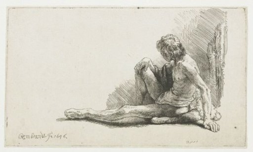 Young man, seated on the ground with one leg extended